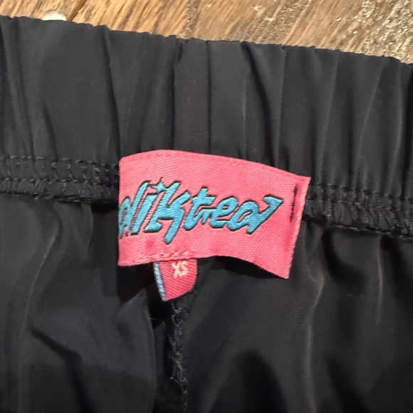 Women’s size XS  Edikted navy blue track pants with side stripe bow detail - Picture 4 of 6